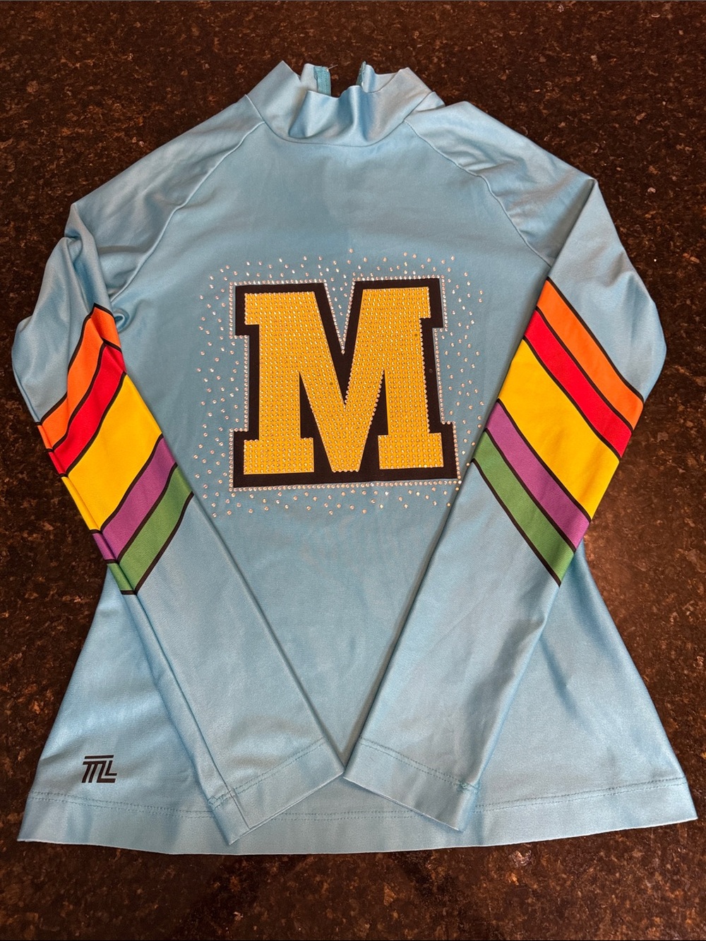 Light Blue M Long-Sleeve Top with Yellow 'M' and Rainbow Sleeves